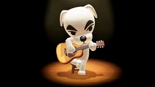 k k slider holding guitar