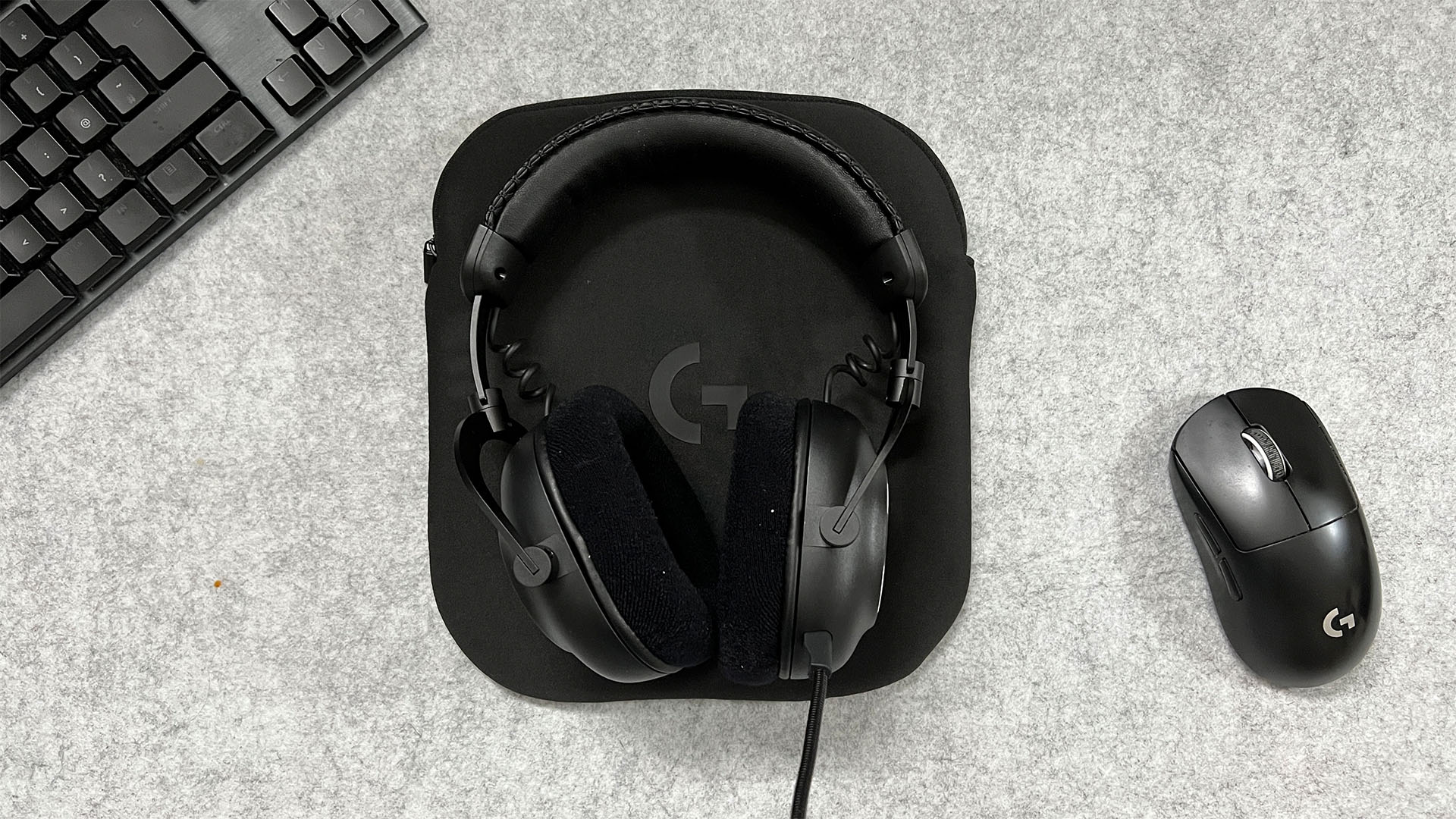 Logitech G PRO X 2 resting on its included carry case